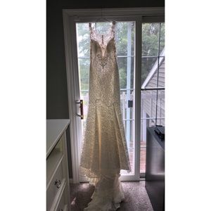 Brand new allure wedding dress with tags.
